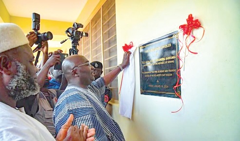 Fire Academy and Training School at Wungu. Inset: Dr Bawumia unveiling a plaque to inaugurate the training school