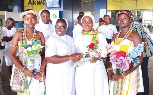 Reverend Sister Jusinta Kwakyewaa Osei being welcomed at the airpot by church and family members
