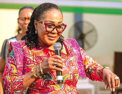 Lordina Mahama (inset) addressing some of the widows
