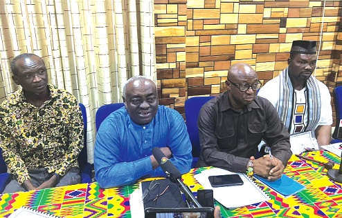 Mark Dankyira Korankye  (2nd from left), General Secretary of TEWU, addressing the press. With him is Ambrose Yaw Kwadzodza (right), National Chairman of TEWU, and other senior executives of the association