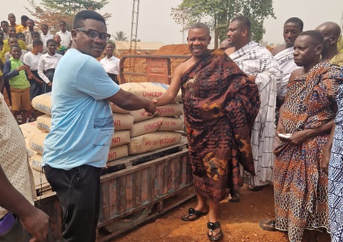 Appianyinasehene donates cement to improve education and healthcare in 3 towns