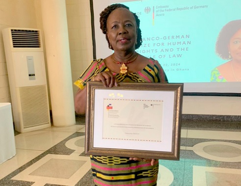 Prof. Abena Takyiwaa Manuh with her Franco-German Award for her Human Rights advocacy