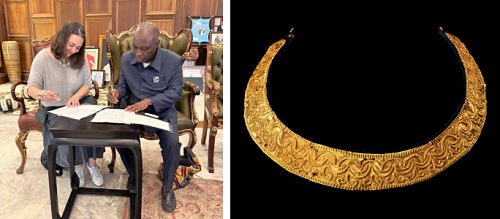 Silvia Forni (left), director of the Fowler Museum at UCLA, and Ivor Agyeman-Duah, director of the Manhyia Palace Museum in Kumasi, Ghana, sign documents returning seven objects to Otumfuo Osei Tutu II, the Asante king.