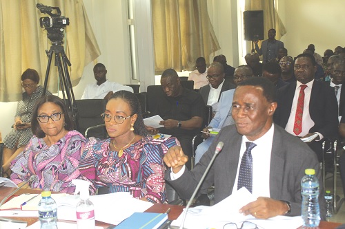 Rev. Dr Ammishaddai Owusu-Amoah (right), Commissioner General, Ghana Revenue Authority (GRA), answering questions at the PAC sitting in Accra. Those with him are Abena Osei-Asare (middle), a Deputy Minister of Finance, and Stella Dede Williams (left), Coordinating Director-Operations, GRA. Picture: ESTHER ADJORKOR ADJEI