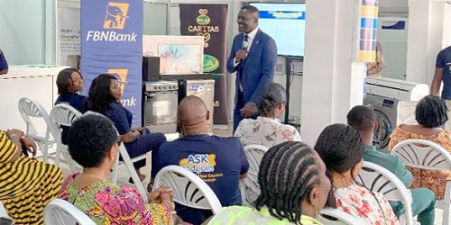 Victor Yaw Asante (with mic),  MD of FBNBank, addressing the guests at the draw