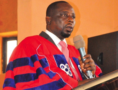 Dr Dickson Tsey (inset), Principal of AMECO, taking the fresh students through the matriculation oath