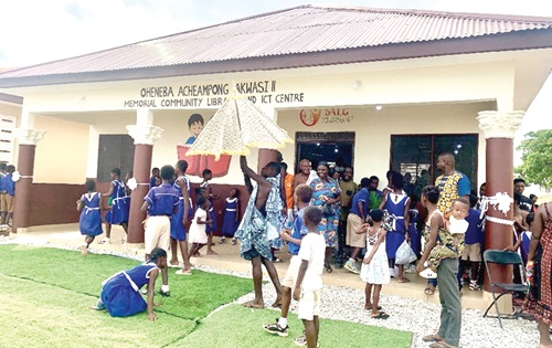 The interior of the computer laboratory. RIGHT: Pupils of Afari Presby School in a jubilant mood after the inauguration of the library 