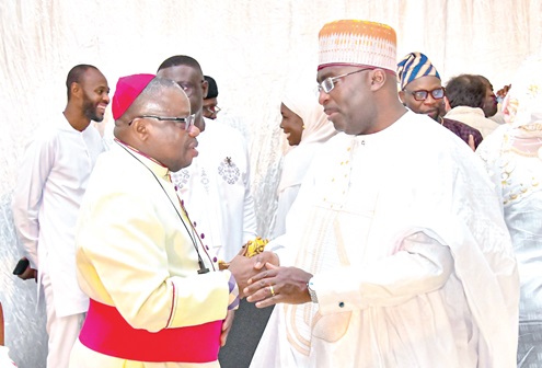 Rev. Fr Dr Daniel Sylvanus Mensah Torto (left), Anglican Bishop of Accra, commending the Vice-President at the Jubilee House