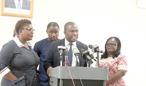 Dr Eric Nkansah (2nd from right), Director-General of the Ghana Education Service, addressing the media in Accra. With him are some officials of the GES. Picture: EDNA SALVO-KOTEY