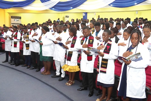 Newly qualified physician assistants and certified registered anaesthetists swearing their oaths during the induction ceremony. Picture: ELVIS NII NOI DOWUONA