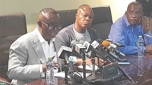 Andy Appiah-Kubi (left), the Chairman of the Foreign Affairs Committee, addressing the press