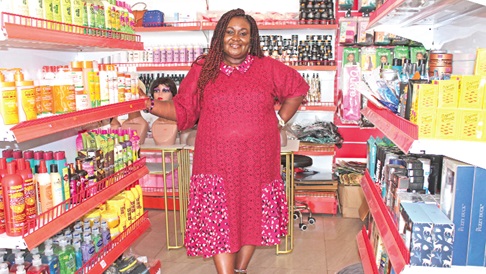 Ms Boadi in her beauty supply shop at Spintex, Accra. Picture Credit: ERNEST KODZI