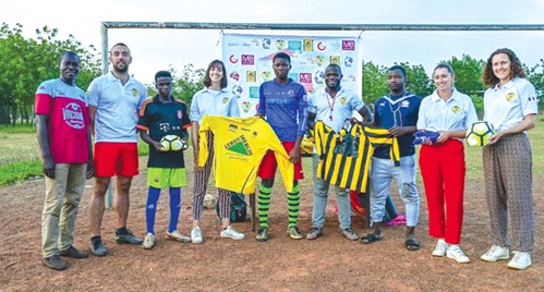 RSG staff and coaches (from left to right): Lukman, Capito, Latif with French volunteers (Pierre, Laure, Lucie and Severine) and the captains of girls and boys teams, during the competition at Tolon