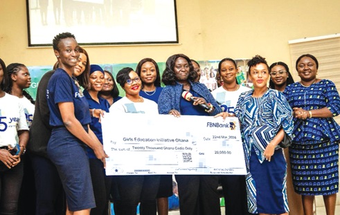  Grace Isaac-Aryee (left), Treasurer & Chairperson of FBNBank Women’s Network, presenting the cheque to Elizabeth Akua Nyarko Patterson, Executive Director of GEIG