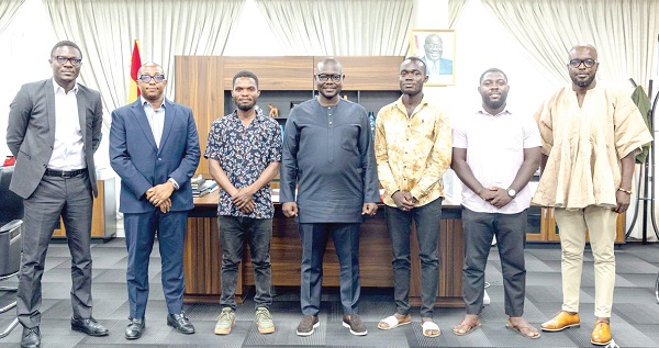  Francis Asenso-Boakye (3rd from left), Minister of Roads and Highways, with members of Buz Stop Boys Group