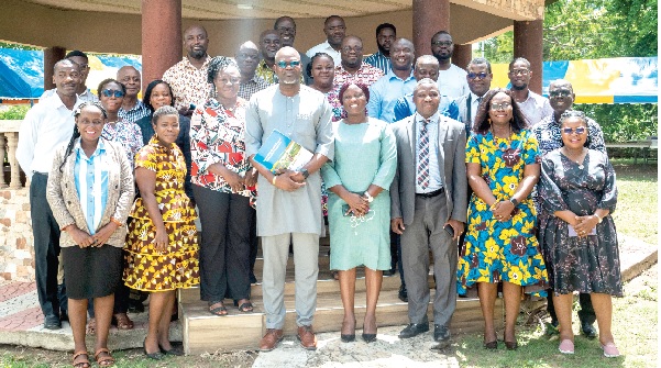 Prof. Paul Bosu (in suit), Director-General of CSIR, Dr Wilhelmina Quaye (4th from right), Director of CSIR-STEPRI, and Prof. Emmanuel Wendsongre Ramde (5th from right), Executive Director of WASCAL, with the participants after the meeting