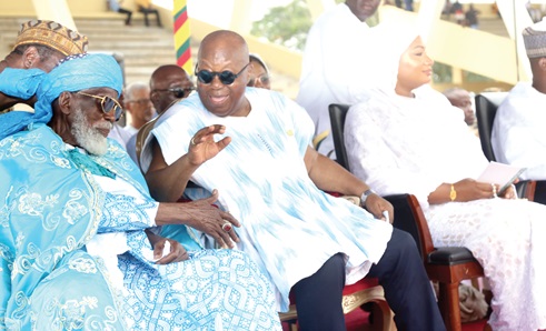 President Akufo-Addo interacting with Sheikh Usmanu Nuhu Sharubutu (left), the National Chief Imam, at the Independence Square to mark the 2024 Eid-Mubarak in Accra. With them is Samira Bawumia, wife of the Vice-President 