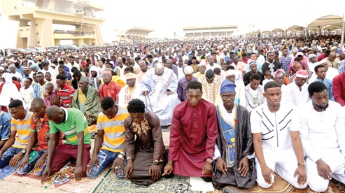 Some of the Muslims praying to mark the end of the Ramadan fasting and prayers  at the Independence Square in Accra. Picture: SAMUEL TEI ADANO