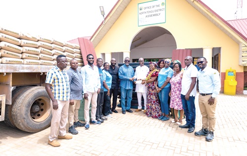 Officials of Cenpower and the North Tongu District Assembly at the site of the donation