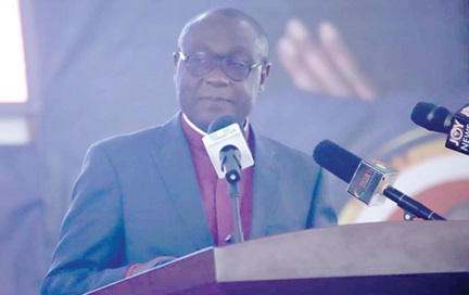 Reverend Ernest Adu-Gyamfi (left), President, National Peace Council, speaking at the 61st Ghana Baptist Convention Ministers Conference at Ejura