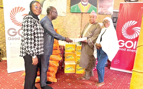 Robert Kyere (2nd from left), PR Manager of GOIL, presenting the items to the Chief Imam’s Office Manager