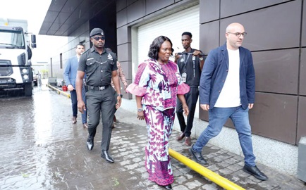 The fire engine on display. INSET: Naana Eyiah (middle), Deputy Minister for the Interior, accompanied by Kassem M. Odaymat, Chief Operating Officer of Rana Motors, to inspect the fire engine 