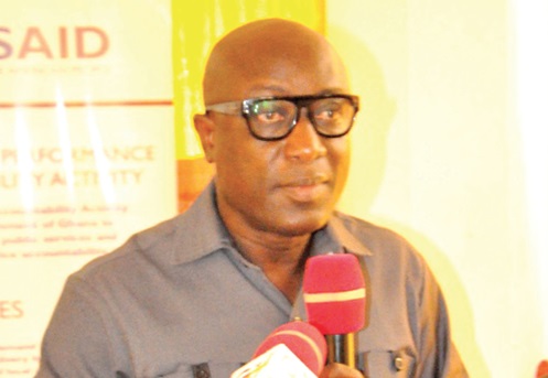 Augustus Awity (left), the Chief Director of the VRRC, launching the PAA
