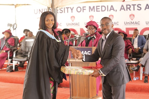Priscilla Amoah (left), receiving the Best Graduating Student in Print Journalism from Charles Benoni Okine, Assistant Editor, Graphic Business.  Picture: ESTHER ADJORKOR ADJEI
