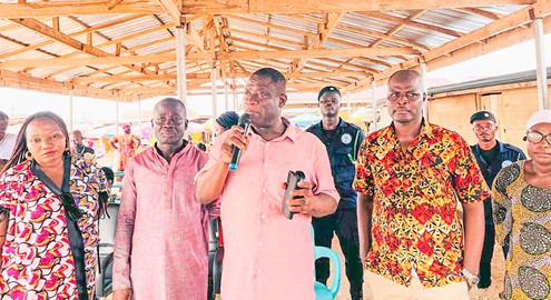Kofi Ofori (middle with microphone) speaking during the fire safety sensitisation
