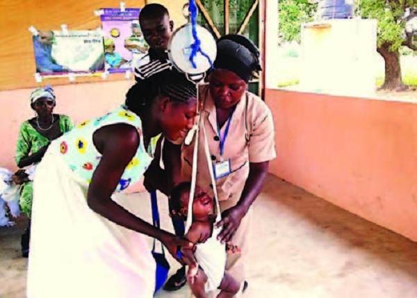 File photo: A baby going through weighing 