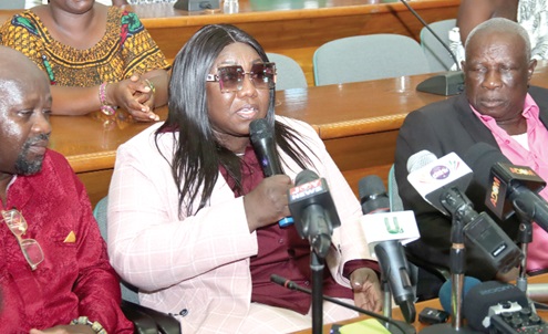 Some participants in the event. INSET: Peggy Naa Ayikailey Adamafio, President and Founder, Relief and Aid International, addressing the participants. Picture: ELVIS NII NOI DOWUONA