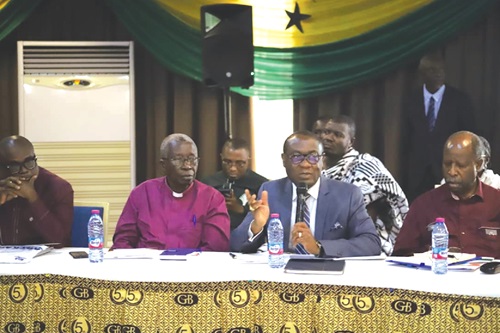 Rev. Dr Ernest Adu-Gyamfi (hand raised), Chairman, National Peace Council, speaking at a stakeholders dialogue in Kumasi. Those with him from right are Leonardo Santos Simao, Head of the United Nations Office for West Africa and the Sahel,  Rt Rev. N.B. Abubekr, Ashanti Regional Peace Council Chairperson, and Ebenezer Asiedu, Head, Democracy and Good Governance Division, ECOWAS Commission. Picture: EMMANUEL BAAH