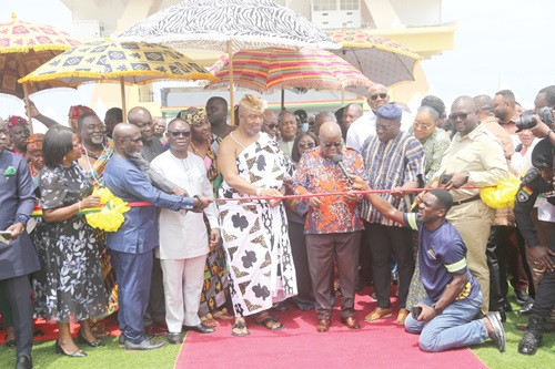  President Akufo-Addo (4th from right), being assisted by  King Tackie Tawiah Tsuri II,  (4th from left), Ga Mantse; Francis Asenso-Boakye (right), Minister of Roads and Highways; Irene Naa Torshie Addo-Lartey (2nd from right), Administrator, District Assemblies Common Fund, Martin Agyei-Mensah Korsah (3rd from right), Minister of Local Government, Decentralisation and Rural Development, to commission the heavy-duty trucks for the DRIP. Picture: SAMUEL TEI ADANO