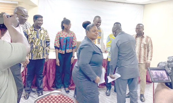 Albert Kwabena Dwumfour (2nd from right), President of GJA, congratulating members of the awards committee