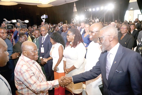 President Akufo-Addo (left) exchanging pleasantries with Larry Gbevlo-Lartey, former National Security Coordinator, at the summit in Accra. With them are Kathleen Addy (3rd from right), Chairperson, NCCE; Nana Aba Anamoah (4th from right), a journalist, and Affail Monney (5th from right), former GJA President. Picture: SAMUEL TEI ADANO