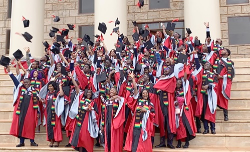 The graduates in celebratory mood after receiving their certificates