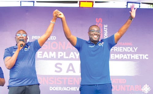  Dr Mahamudu Bawumia (left) introducing Sammy Awuku, NPP parliamentary aspirant for Akuapem North