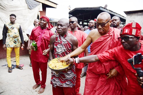The traditional leaders undertaking customary rituals during the festival