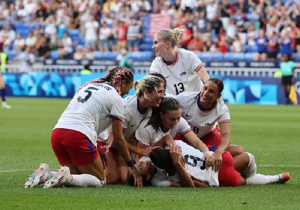 Team USA celebrating their achievement