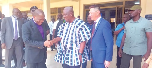 Former President John Dramani Mahama (2nd from right) exchanging pleasantries with Rev. Stephen Y. Wengam, the General Superintendent of the Assemblies of God Ghana. Looking on is Rev. Dominic Yeo (right), Global Chairman, Assemblies of God Fellowship, after the opening ceremony