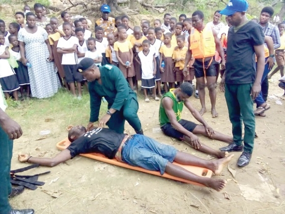 Nana Baah Biney, Advanced Emergency Medical Technician of the Lower Manya Ambulance Service, demonstrating how to save a drowned person 