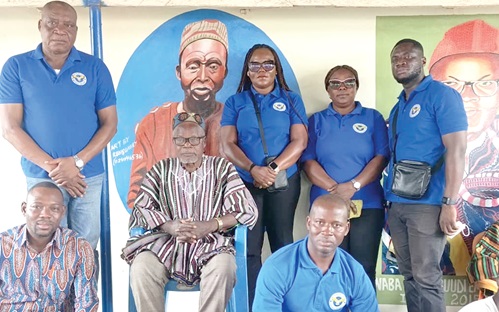 Officials of the National Security Ministry with Naba Emmanuel Ayagiba Abangiba (arrowed), the Chief of Sapeliga