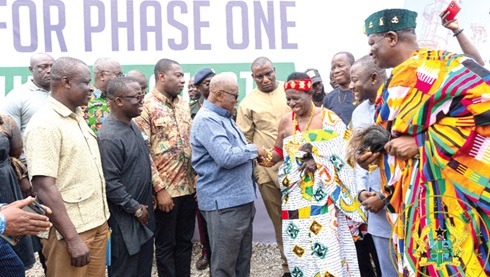  President Akufo-Addo exchanging pleasantries with Awulae Annor Adjaye III, Paramount Chief of the Western Nzema Traditional Area, who is also the Board Chairman of the Petroleum Hub Development Corporation, immediately after the sod cutting