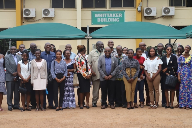 Prof. Leonard Amekudzi(5th right),Provost, College of Sciences, KNUST, and some members of the Board of Trustees,K.C Whittaker Foundation, and lectures of the department of Physics, together with the beneficiaries in a group photograph, after the ceremony in Kumasi.