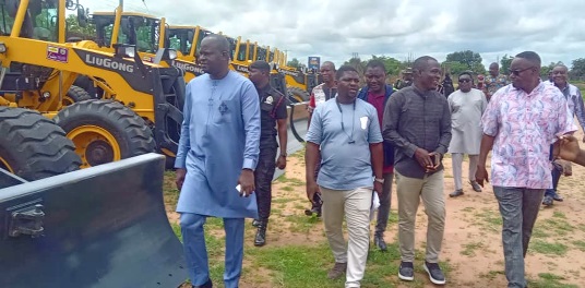 Alhaji Dr Hafiz Bin Salih (left), Upper East Regional Minister, inspecting the DRIP equipment