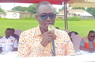 Francis Gumah (left), Regional Operations Manager, World Vision Ghana, addressing the participants