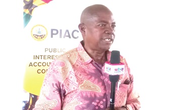 Nana Kweku Dei (left), a member of PIAC, speaking at the forum