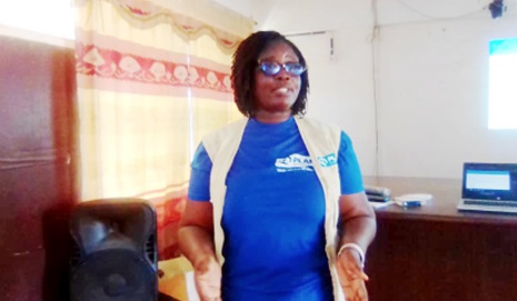 Esenam Ahiadorme, Gender and Influencing Specialist, Plan International Ghana, addressing the participants