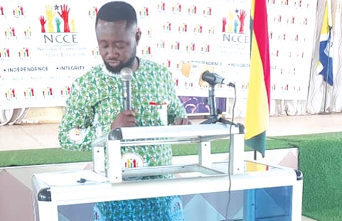 Eric Yarney (left), the Upper Krobo District Director of the NCCE, addressing participantsEric Yarney (left), the Upper Krobo District Director of the NCCE, addressing participants
