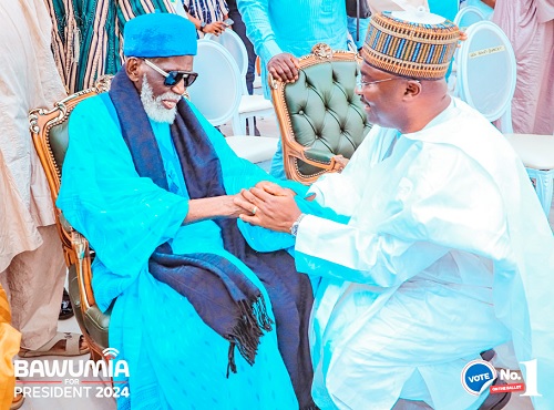 Dr Bawumia (right) exchanging greetings with  Sheikh Usmanu Nuhu Sharubutu, National Chief Imam